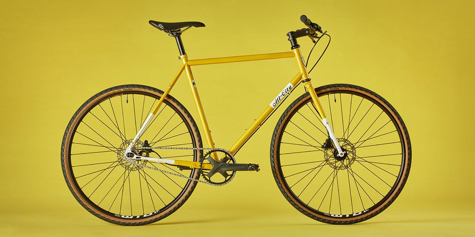 All-City Super Professional in Lemon Dab on yellow background