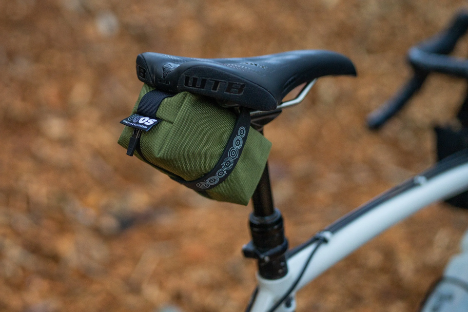 Outer Shell Mini Saddlebag mounted under a WTB saddle