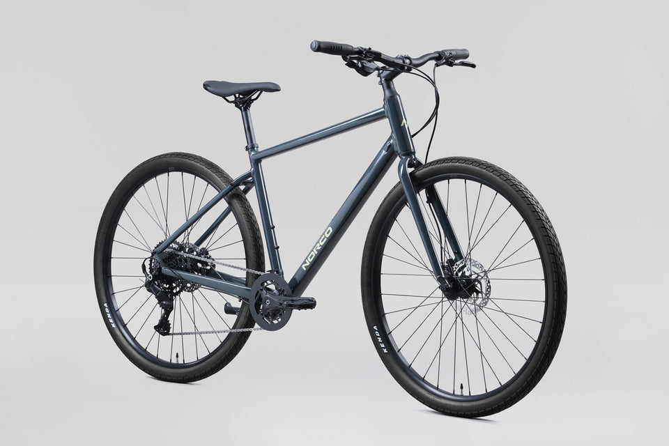 Norco Indie 1 2027 Navy Grey quarter view